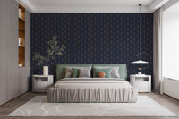Neutral bedroom design featuring a dark navy patterned wallpaper and white nightstands.
