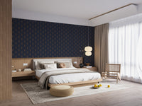 Spacious bedroom with a navy blue patterned wallpaper and light beige bedding.