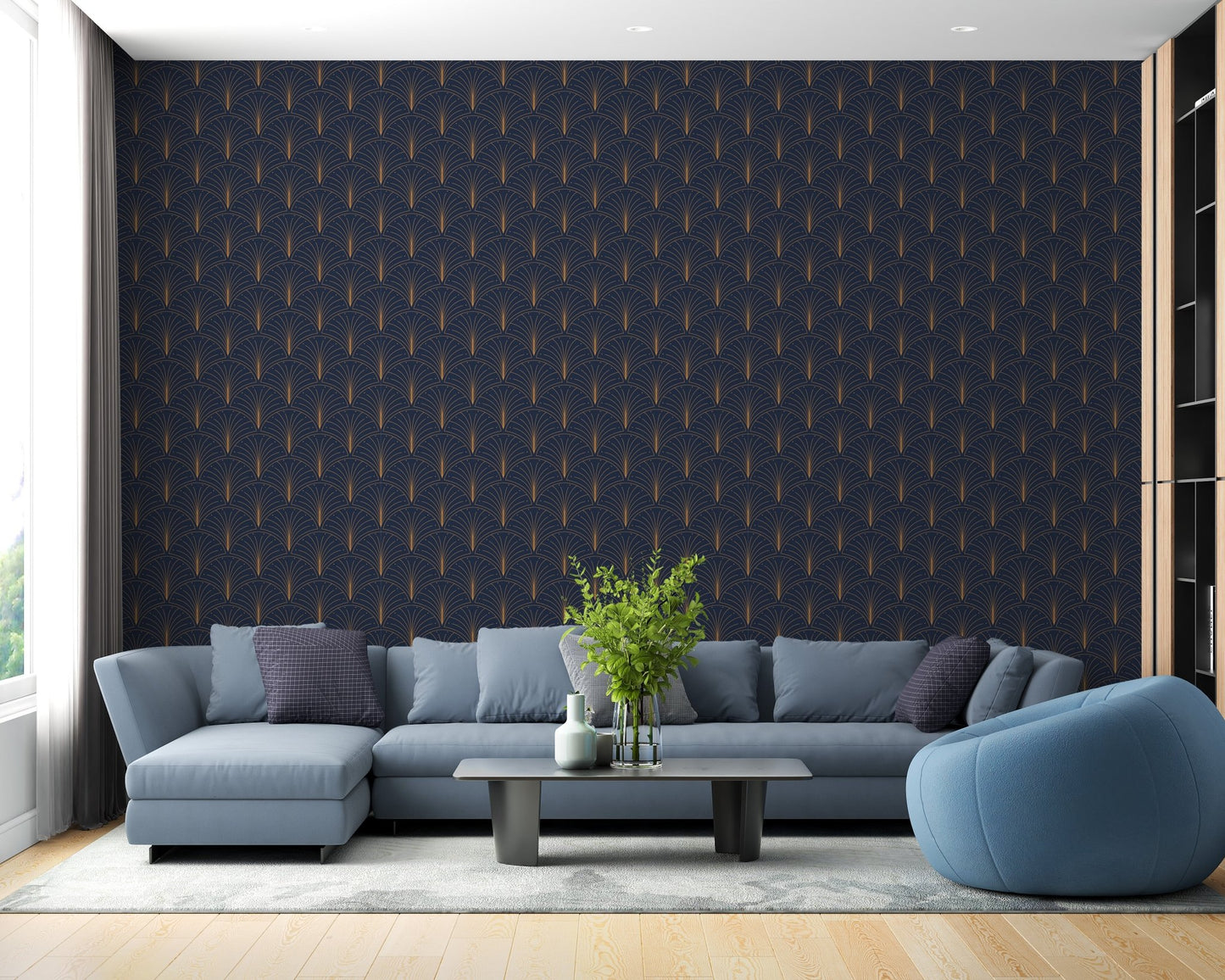 Modern living room showcasing a blue geometric art wallpaper behind a grey sectional sofa.