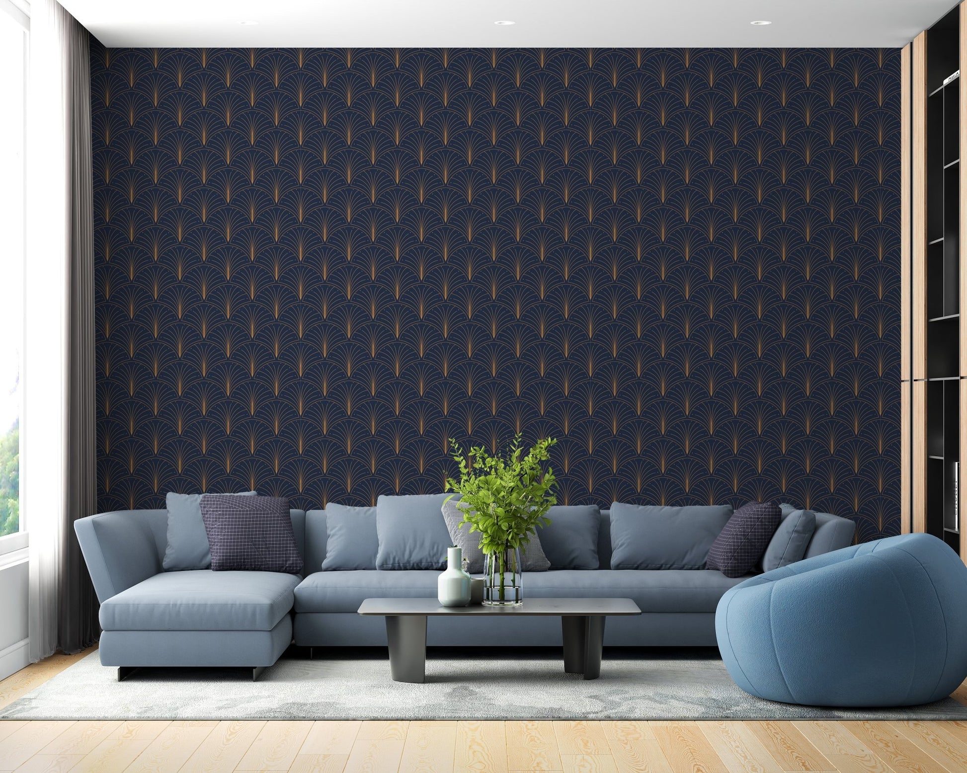 Modern living room showcasing a blue geometric art wallpaper behind a grey sectional sofa.