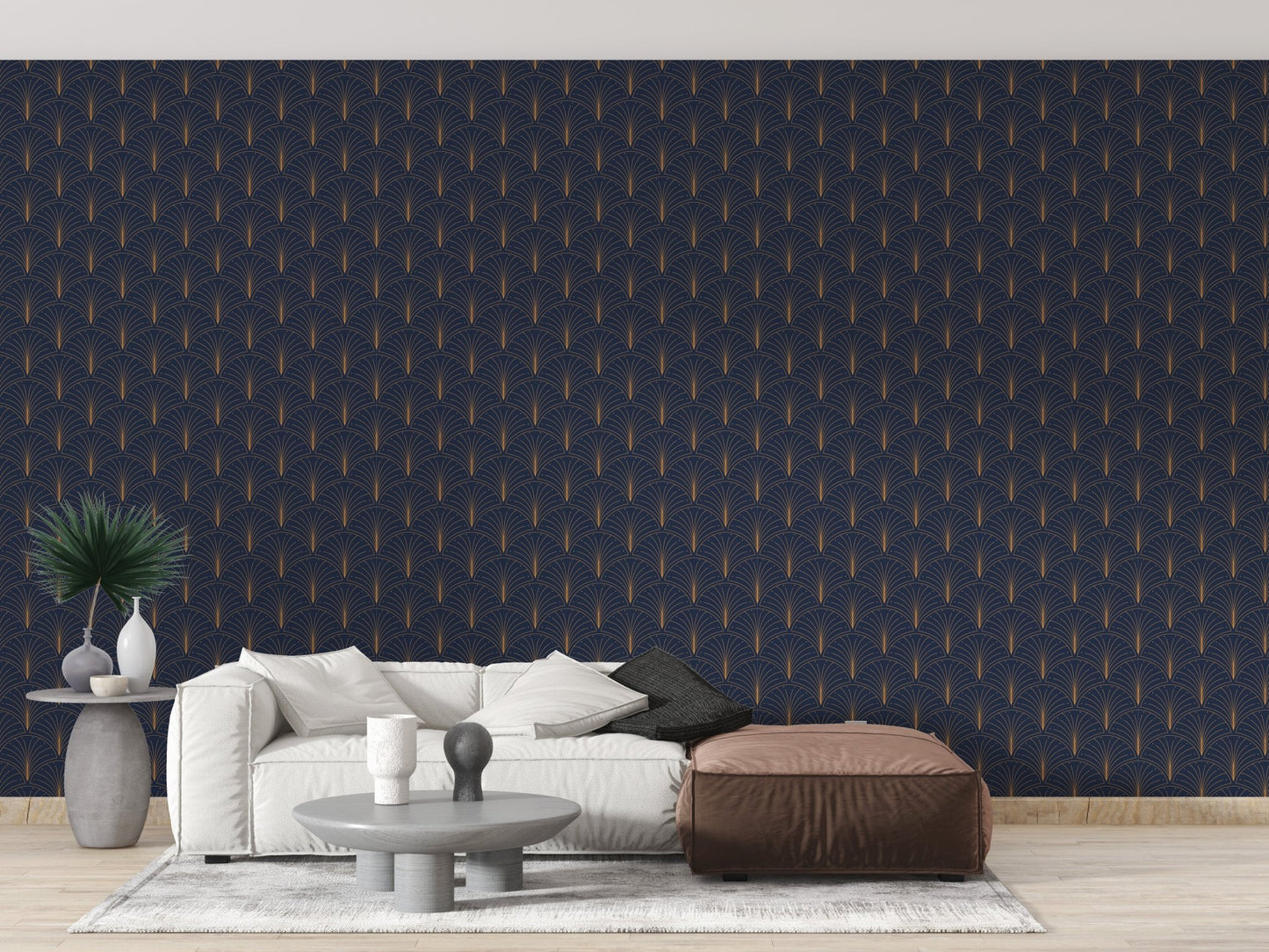 Minimalist living area with dark blue patterened wallpaper and brown leather ottoman.