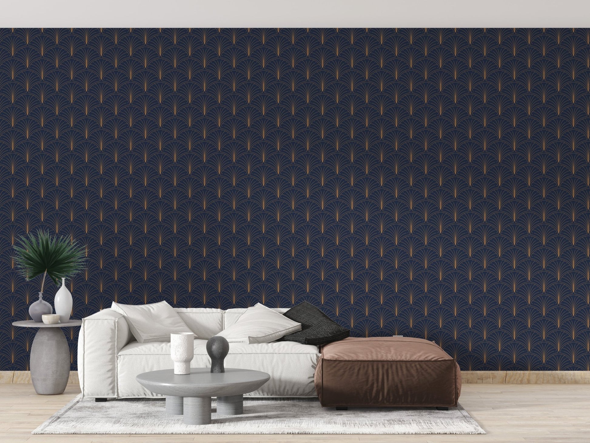 Minimalist living area with dark blue patterened wallpaper and brown leather ottoman.