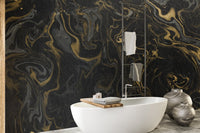Luxurious Black and Gold Wallpaper Marble in a spa-style bathroom with a white tub.