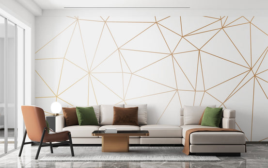 Modern living room with white and gold polygonal wall murals and a beige sectional sofa.