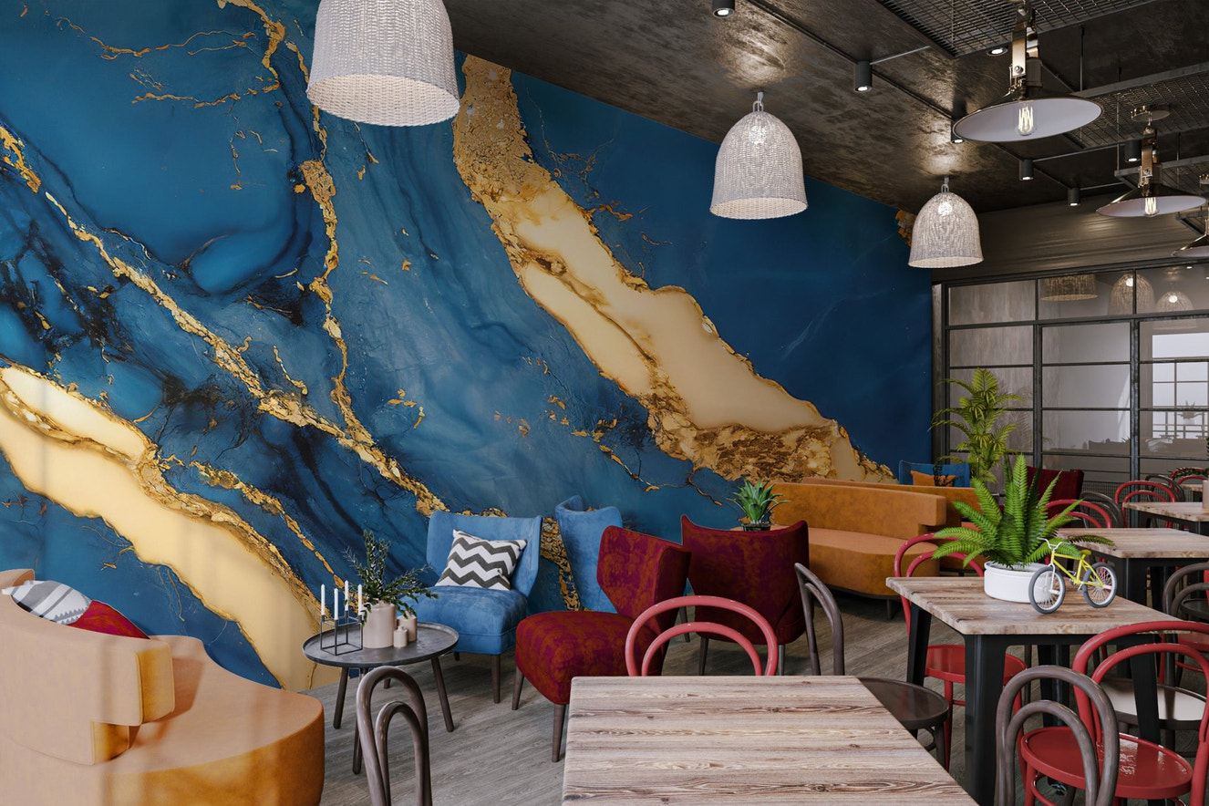 Artistic marble wall mural featuring bold sapphire and gold fluid patterns.