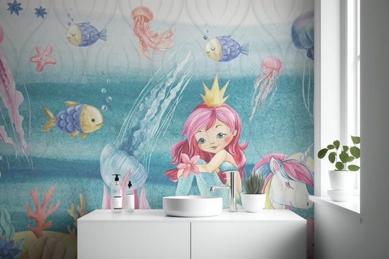 Magical mermaid kingdom wall mural with pink watercolor jellyfish wallpaper.