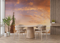 Warm sunset cityscape wall mural backdrop for a contemporary dining area.