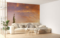 Living room interior with a Manhattans Legacy wall mural behind the sofa.