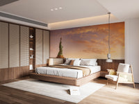 Modern bedroom with Manhattans Legacy wall mural showing a sunset skyline.