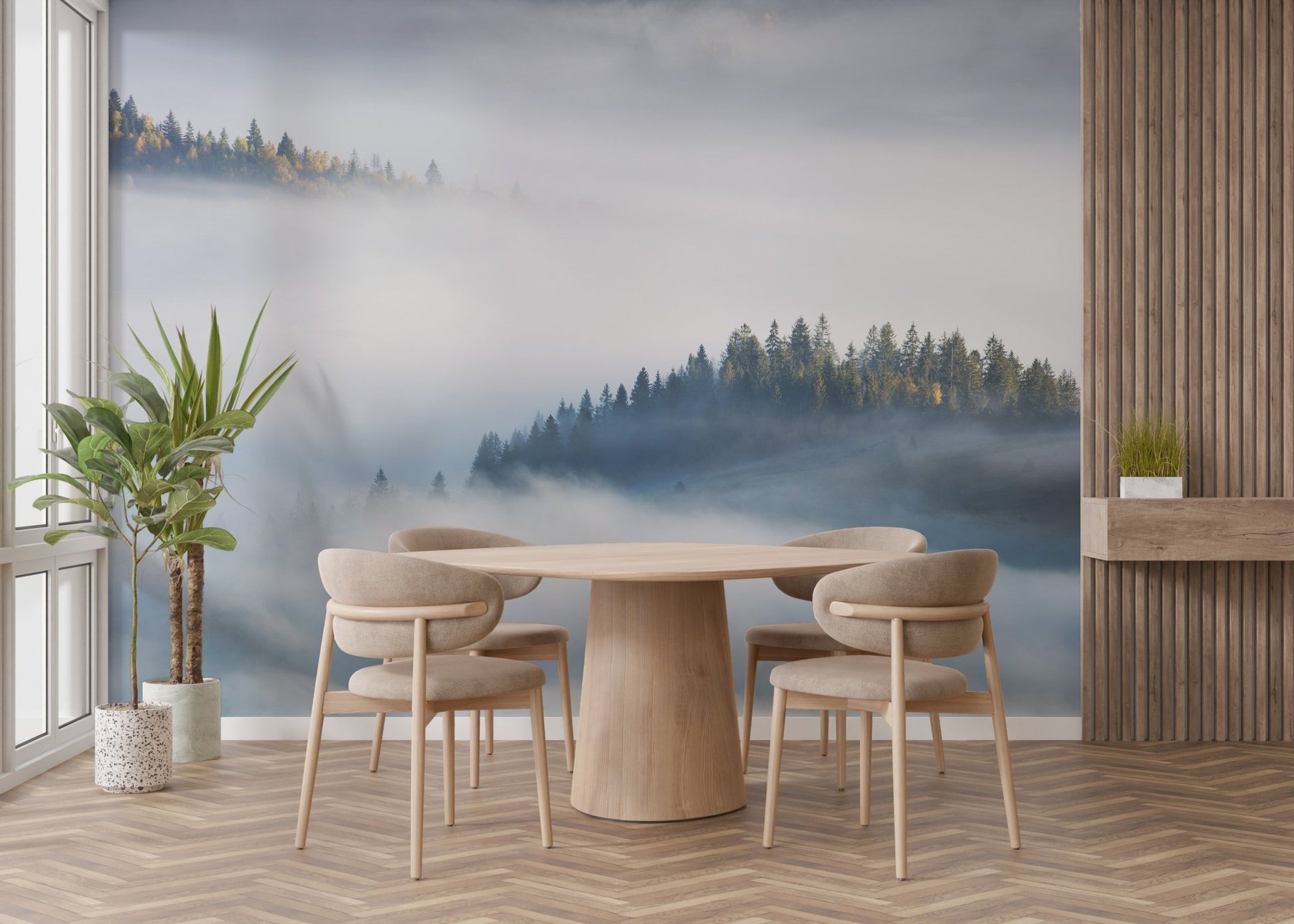Dining area featuring a landscape wallpaper mural with trees and fog.