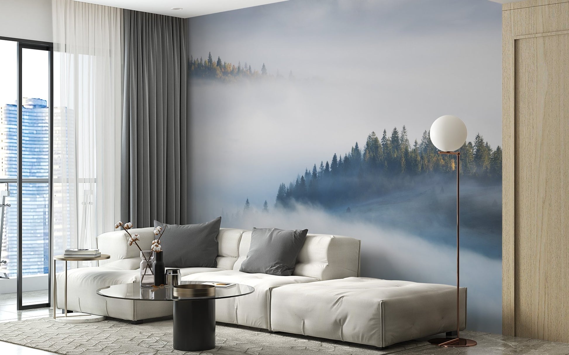 Luxury living room with misty landscape wallpaper mural and white sofa.