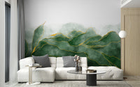 Minimalist white sofa in front of a green watercolor mountain wall mural.