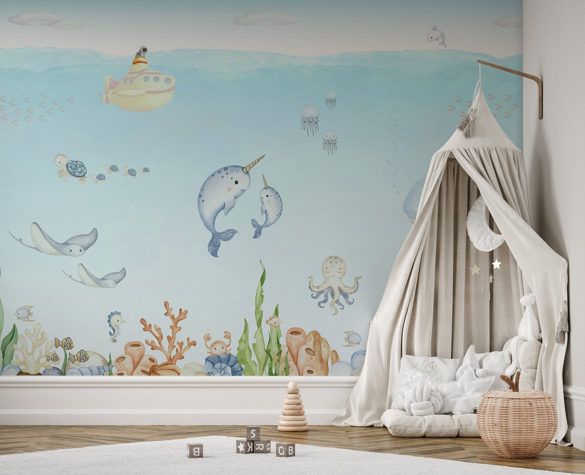 Colorful wall art mural with marine life and a submarine journey.
