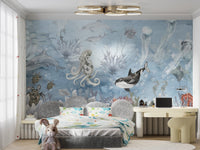 Coastal inspired wall mural in muted blue and grey tones.