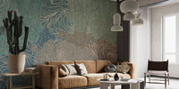 Tan leather sofa in living area paired with textured kaleidoscope wall mural.