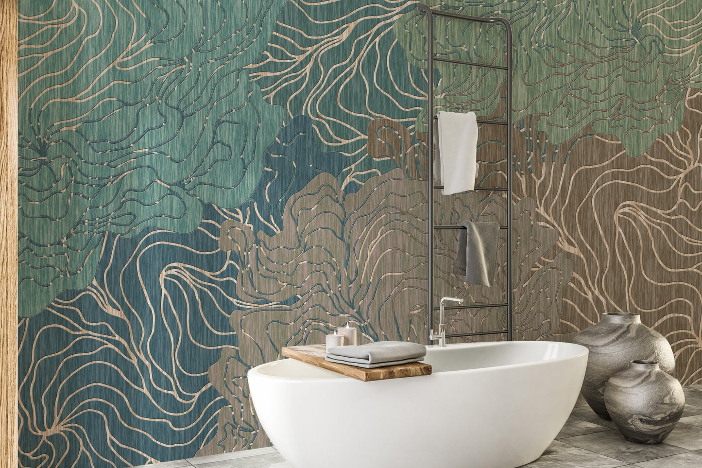 Freestanding bathtub next to gold and teal wavy line wall mural.