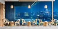 Dark metropolis skyline wall mural with wisteria blue neon tones.