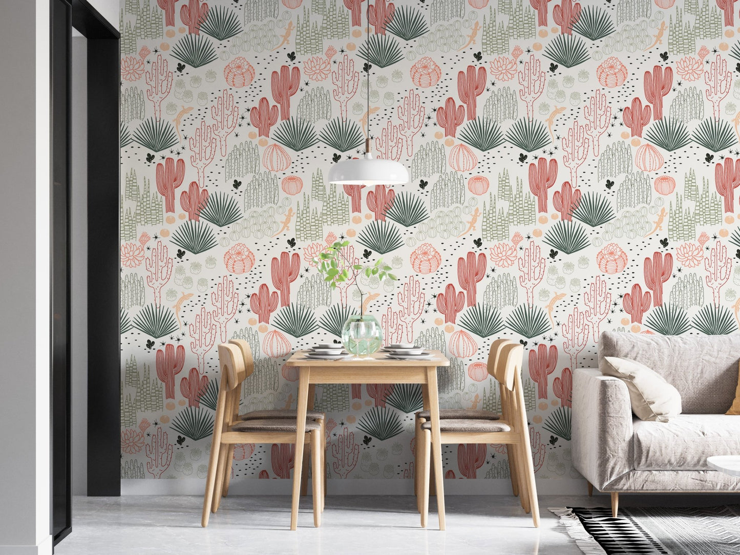 Dining room with desert landscape wallpaper and light wood furniture.