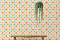 Mid Century Modern Art Pattern Wall mural as a backdrop for a wooden bench and ivy.