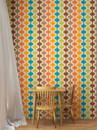 Atomic style wall mural behind a small wooden dining table and chairs.