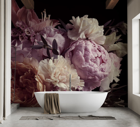 Dark floral garden wall mural in a bathroom with a white freestanding bathtub.