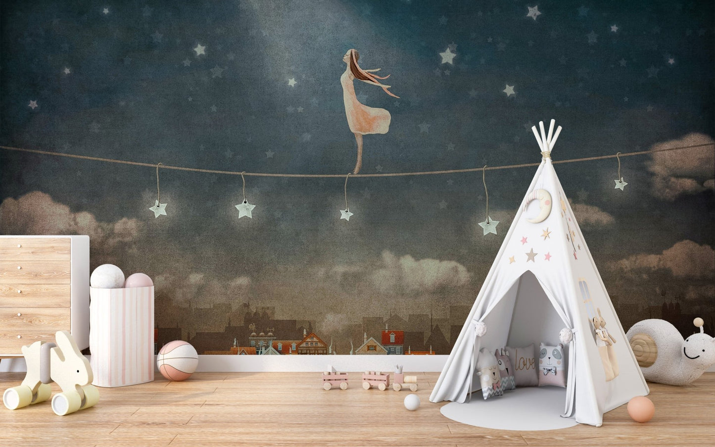 Midnight magic mural adding charm in nursery with houses and night skies.
