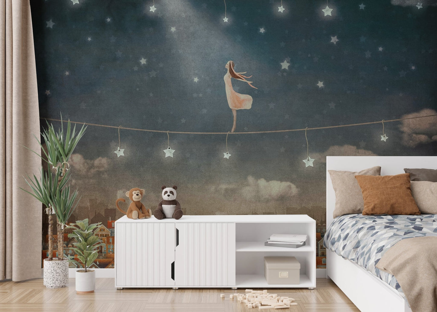 Blue midnight sky wall mural in a child bedroom with a teepee tent.