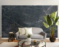 Navy blue natural stone effect wallpaper mural with white veining.