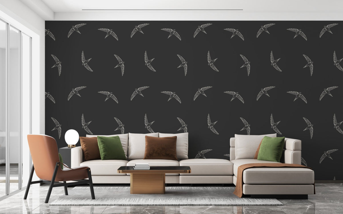 Dark swallow bird wallpaper with hand-drawn white birds in repeating pattern for living room interior.