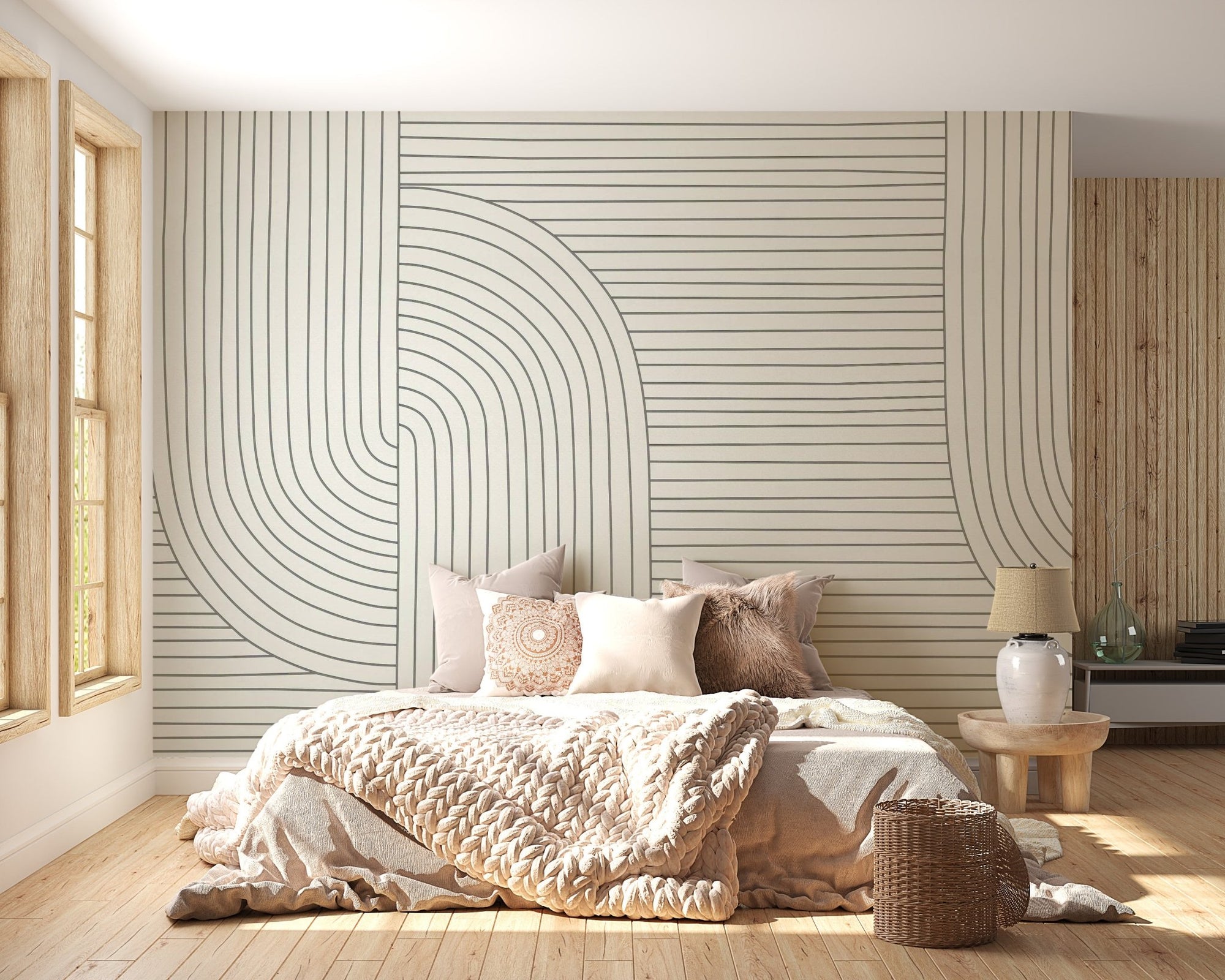 Minimalist line art wall mural in a sunlit bedroom with wooden flooring.