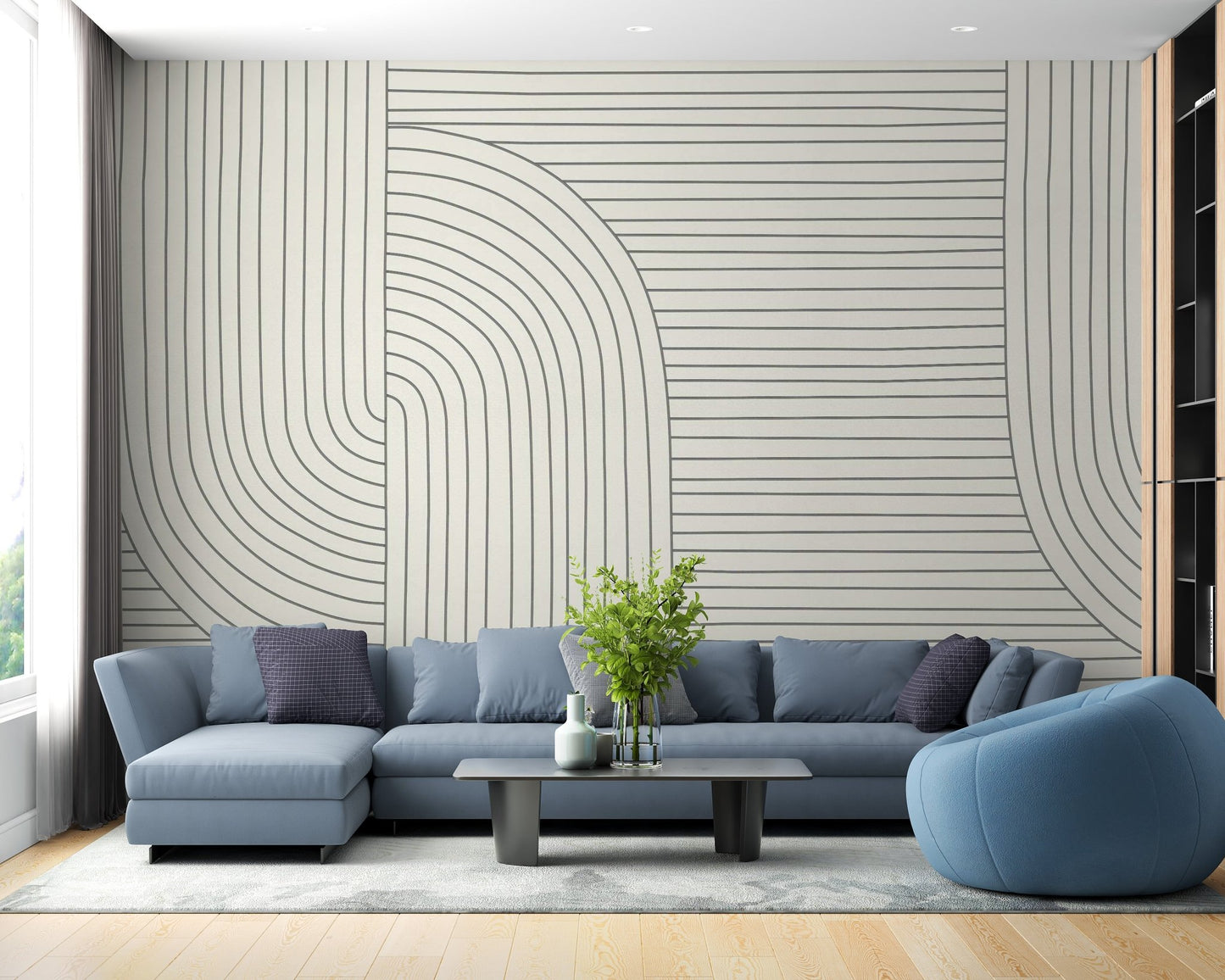 Navy blue sectional sofa against a grey line art wall mural.