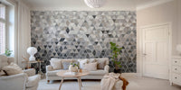 Sleek geometric mirror tile wall mural design in living area.