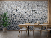 Dazzling glass-like tile pattern wall mural in a dining space.