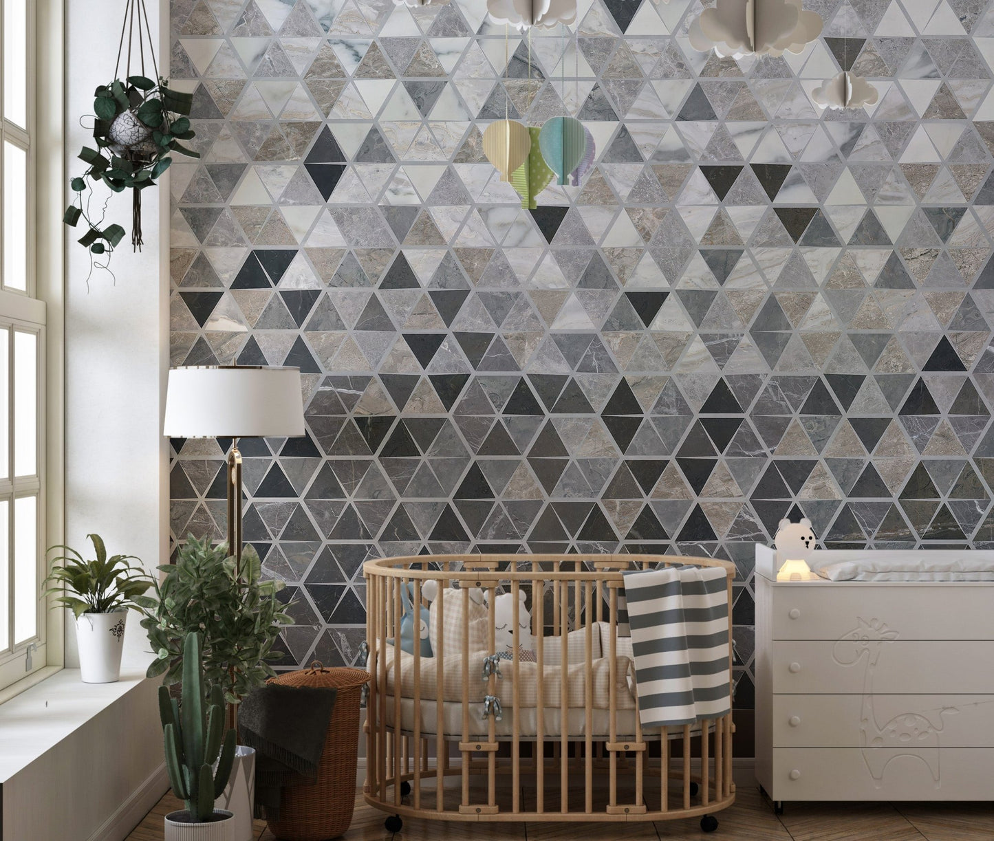 Glossy mosaic mirror tile wall mural in nursery with wooden crib.