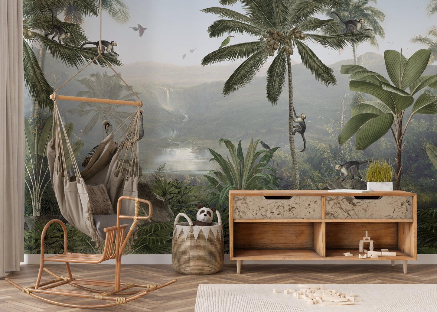 Jungle mural featuring playful mischief monkeys in kids play area.

