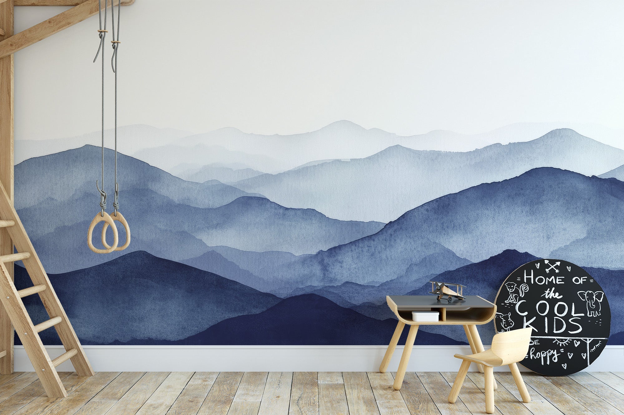Misty blue mountains wall mural in layered navy watercolor tones.