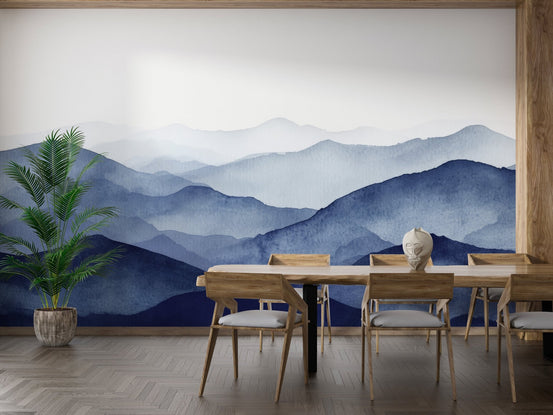 Serene mountain wallpaper mural in cool blue tones.