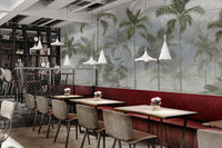 Tropical rainforest mural with misty palm trees in modern cafe.