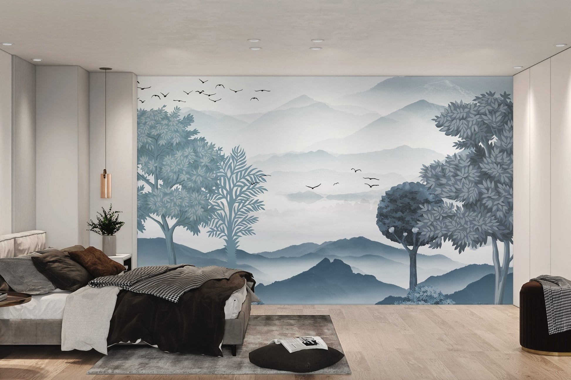 Minimalist blue mountain wall mural with dense tree and bush foreground.