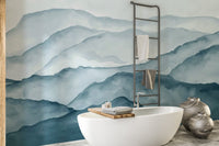 Soft navy and slate blue mountain wallpaper with a misty atmospheric effect.