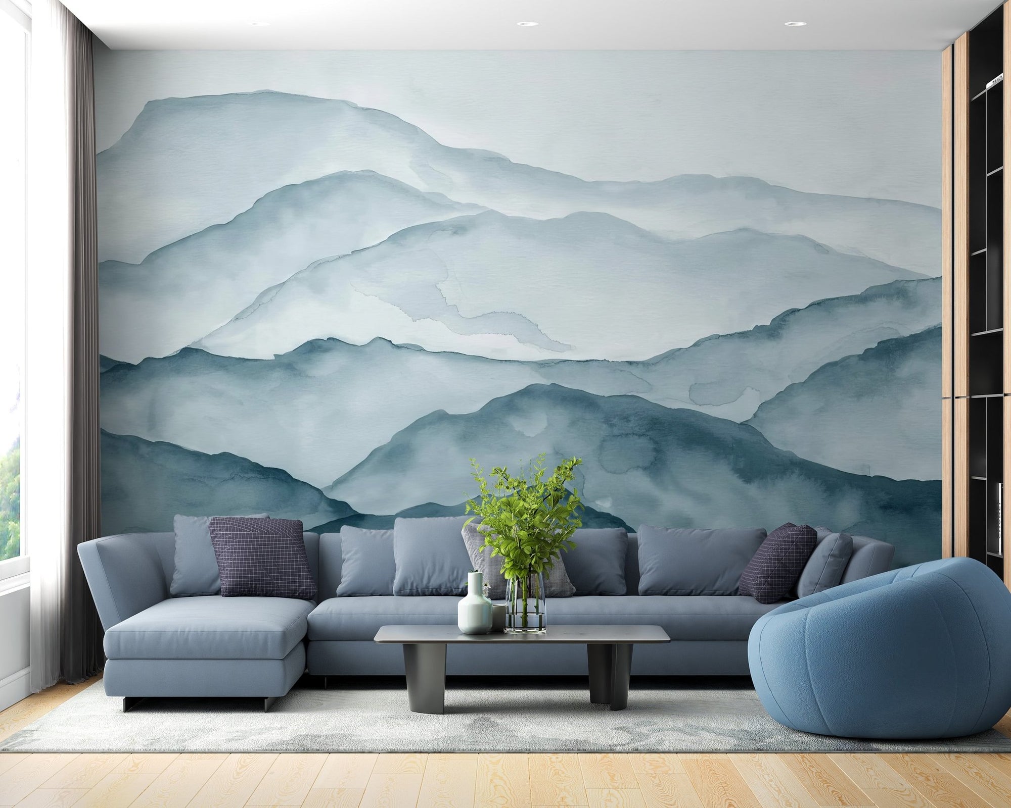 Misty mountain range wall mural with blue watercolor peaks in a layered design.