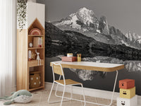 Tranquil mountain scene mural with misty atmospheric tones in kids study area.
