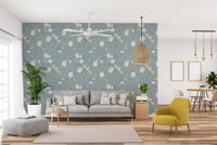 Vintage floral branch wallpaper for living space with calm turquoise color palette.