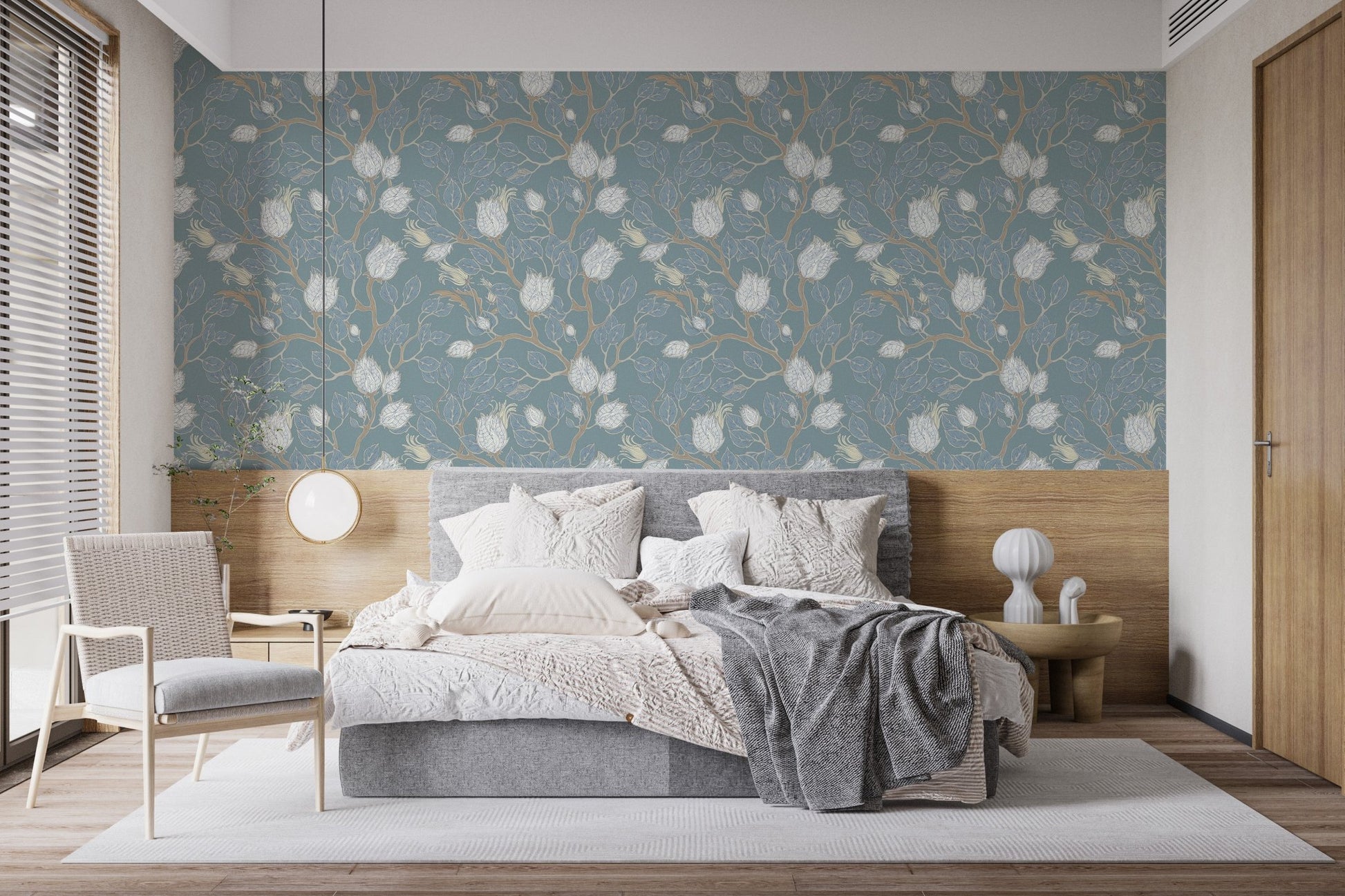 Elegant branch and blossom wallpaper with muted turquoise background.