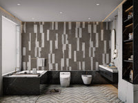Abstract rectangular tile wall mural with distressed white accents in bathroom.
