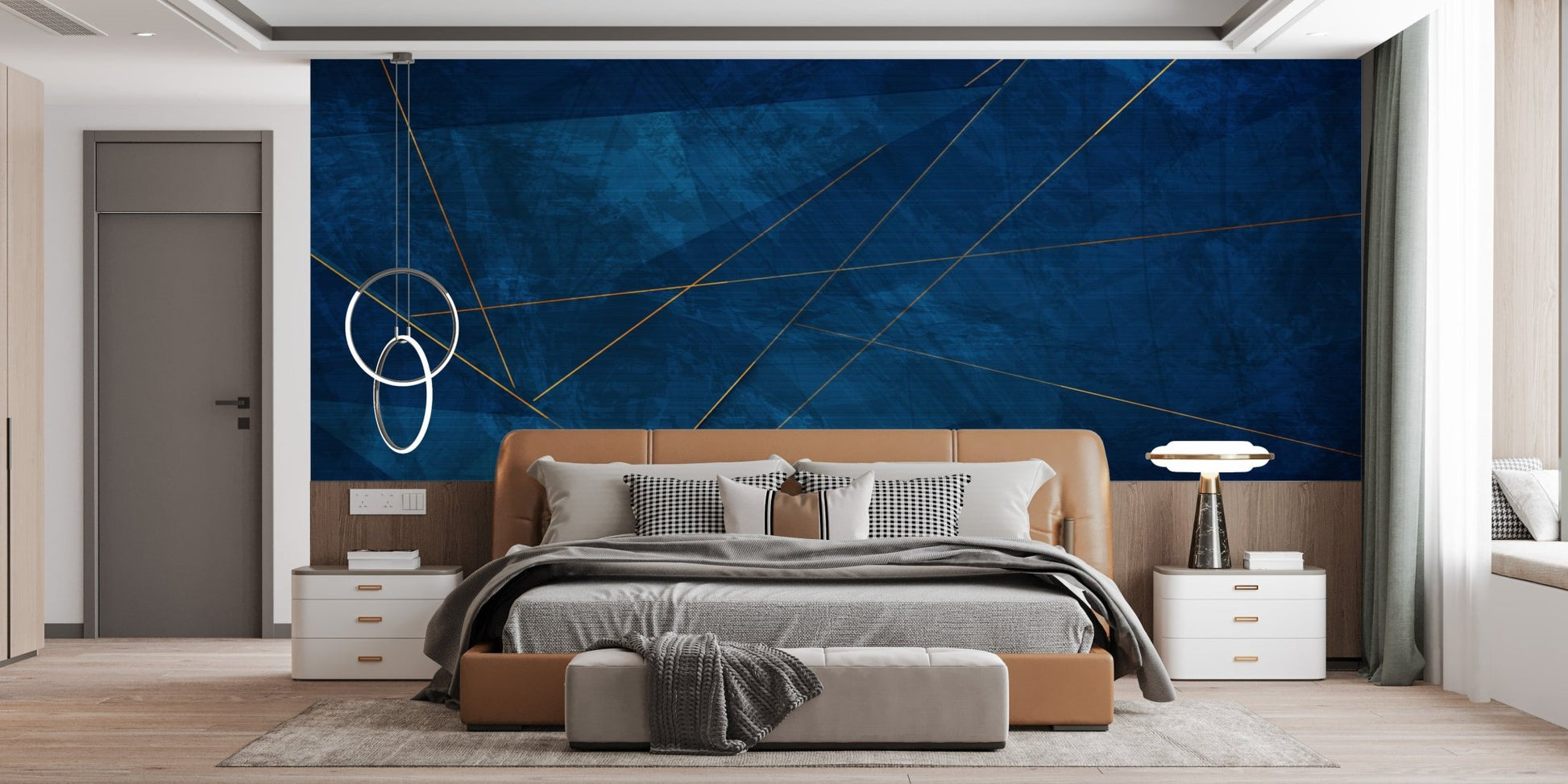Blue textured abstract wall mural with gold geometric lines behind a wooden bed frame.