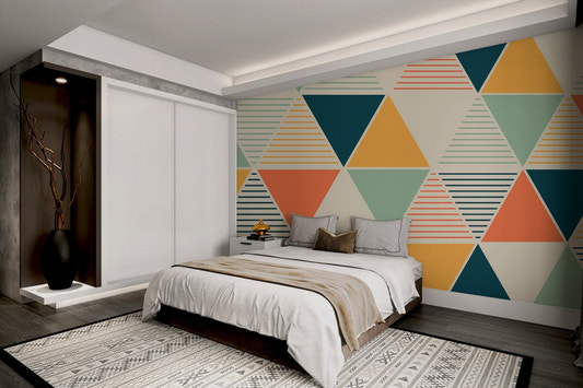 Abstract geometric wall mural featuring mustard and sage triangular shapes.