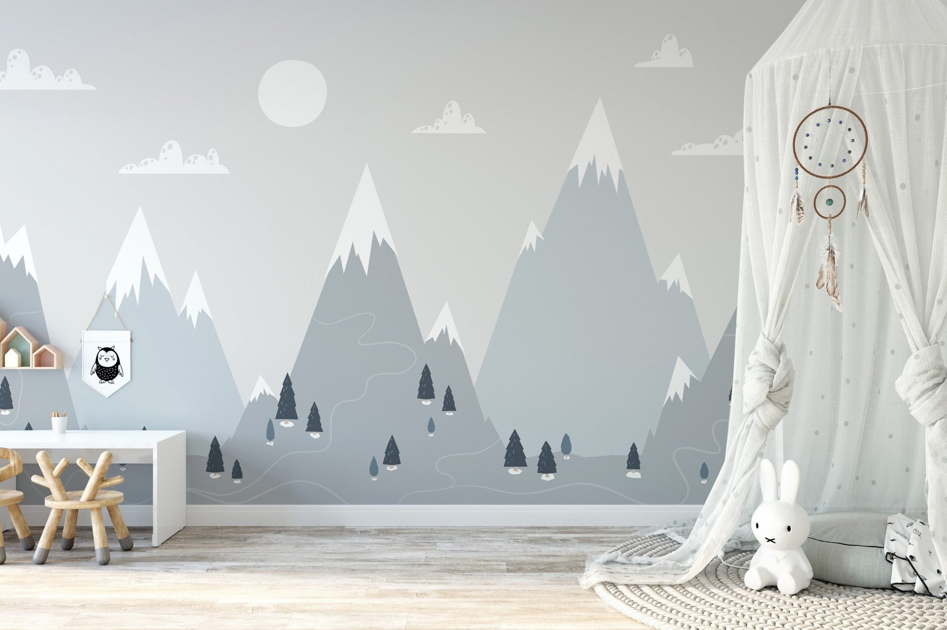 Neutral mountain charm wall mural in a bright room with a white canopy tent.