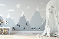 Neutral mountain charm wall mural in a bright room with a white canopy tent.