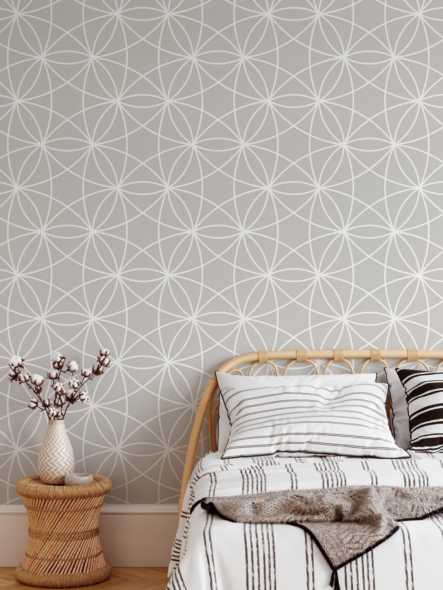 Modern Style Geometric Repeat Pattern Wallpaper in a small bedroom with a side table.